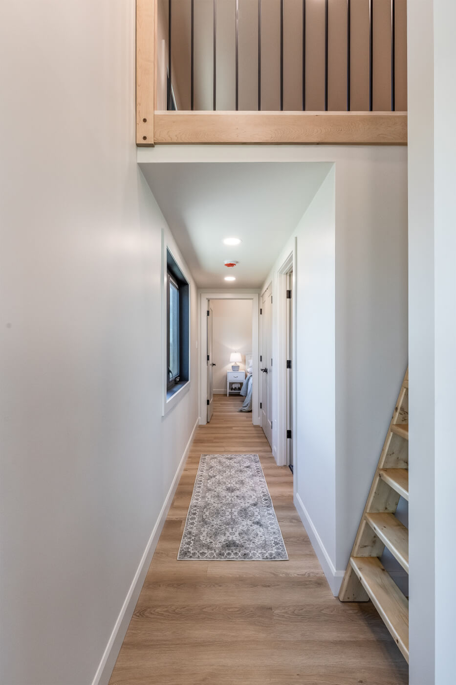 A white-walled hallway in a tiny home