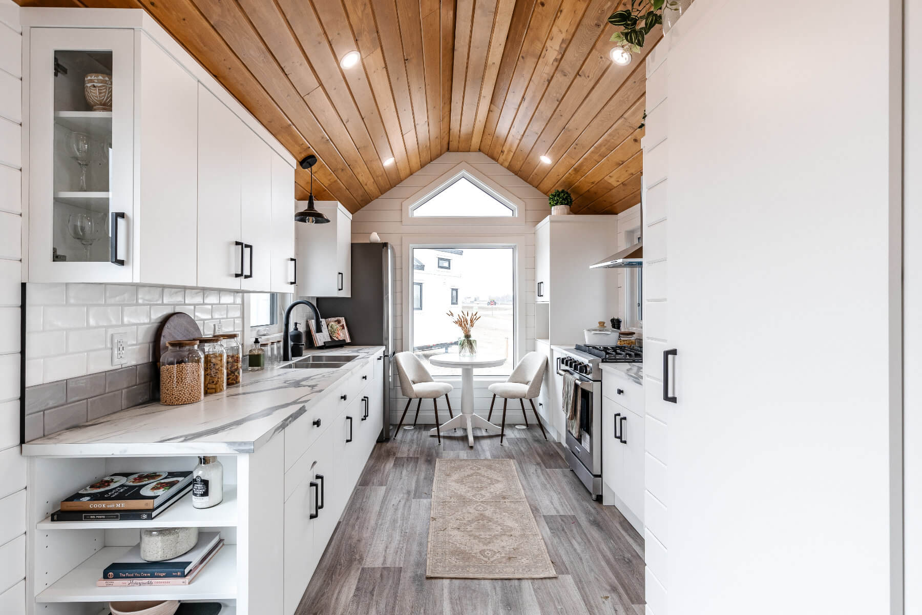 Tiny home kitchen with ample storage and modern fixtures