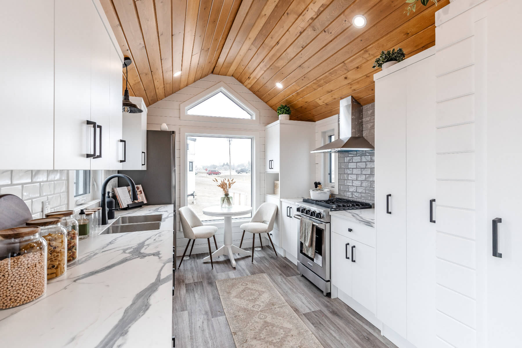 Tiny home kitchen with ample storage and modern fixtures